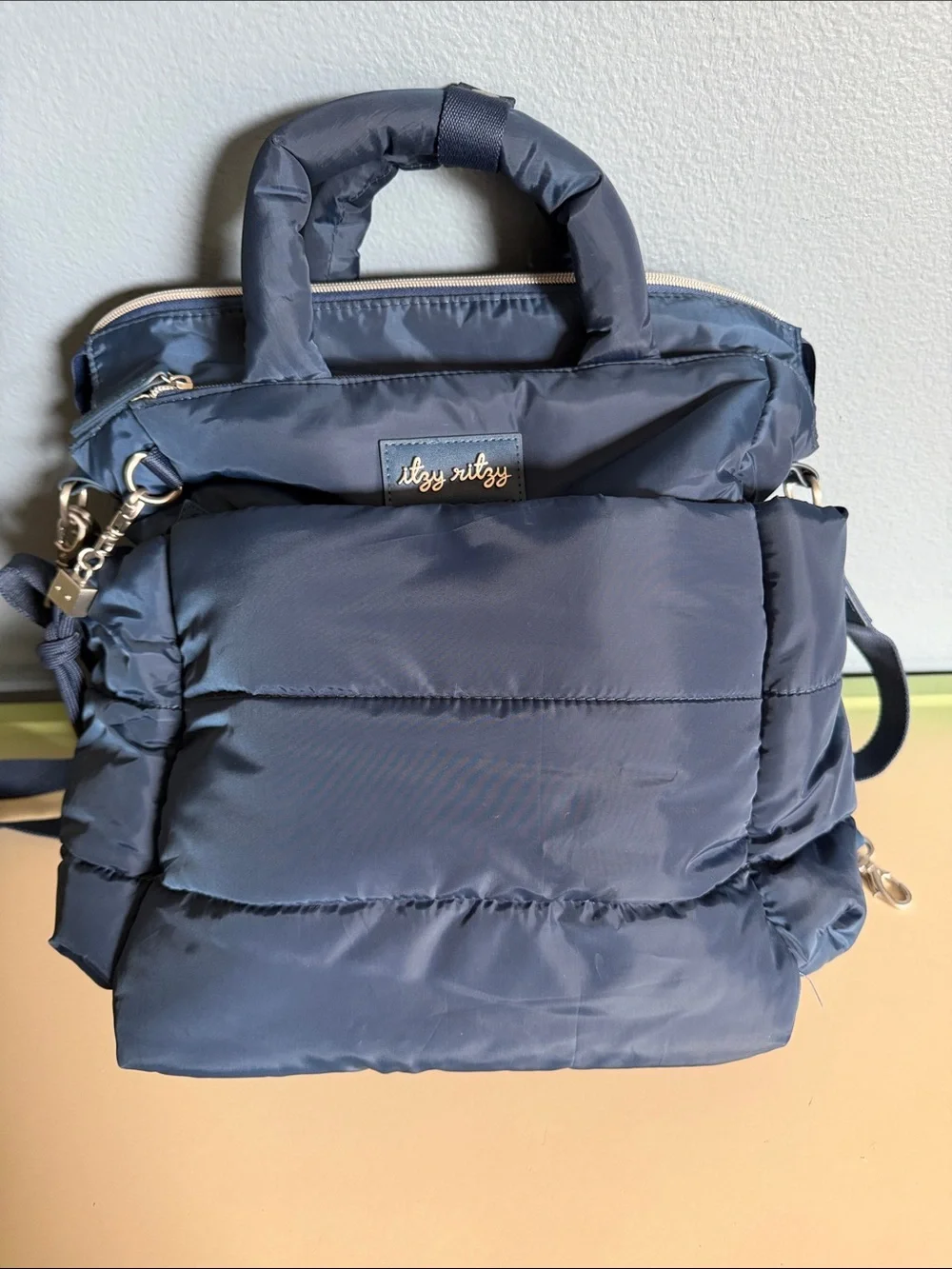 Itzy Ritzy Navy convertible Puffer Backpack diaper bag